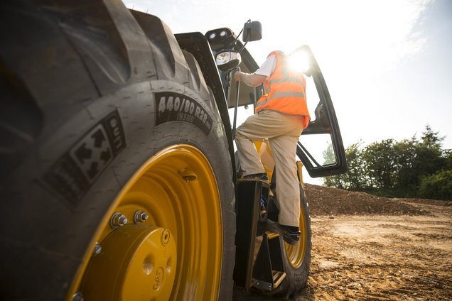 Safe in and out of the backhoe loader cab