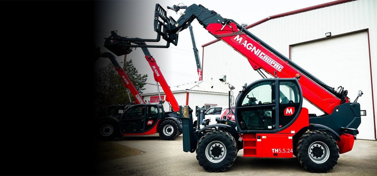 Red fixed telescopic handler front of the building