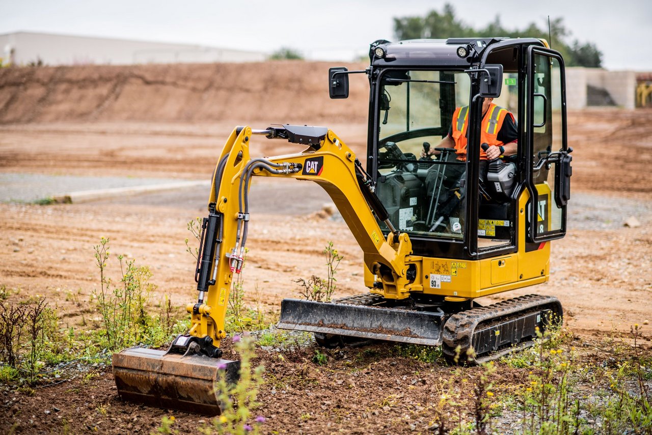 Cat mini excavator at work