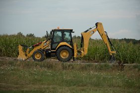 The Cat 432 backhoe loader